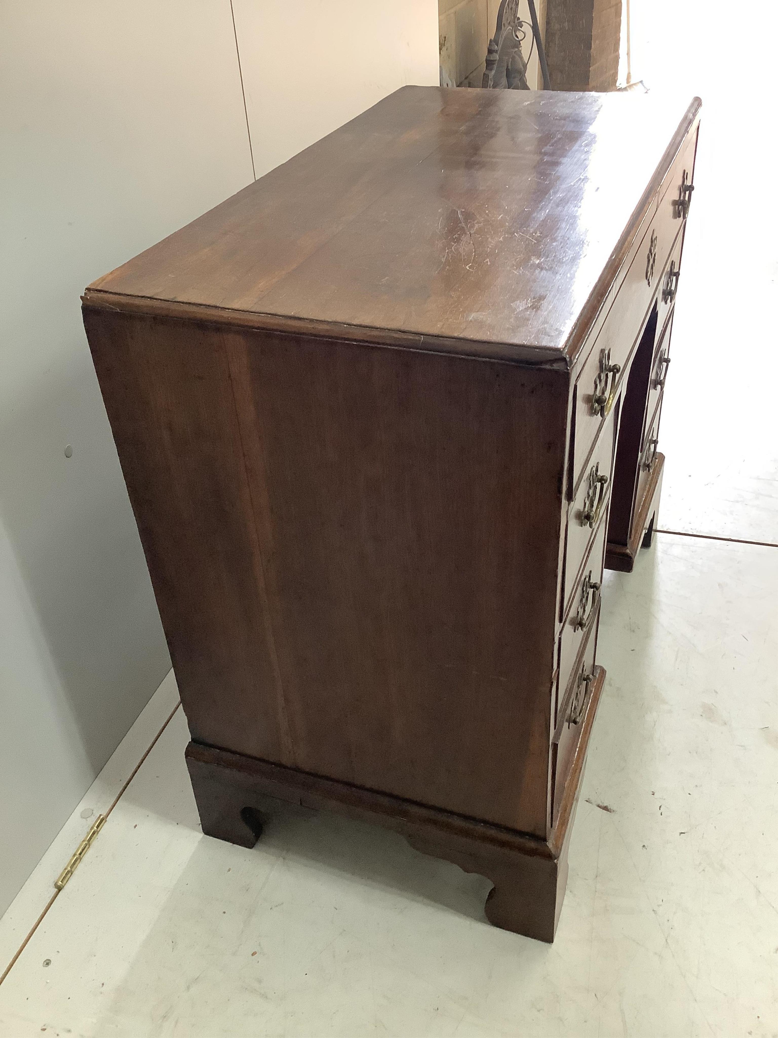 A George III mahogany kneehole desk, width 83cm, depth 44cm, height 76cm. Condition - fair